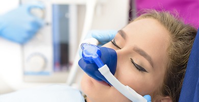 Relaxed woman with nitrous oxide nasal mask