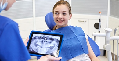 Smiling little girl in dental chair